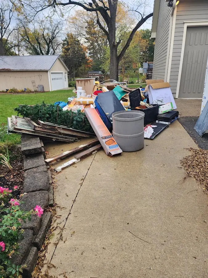 Dumpster being loaded with debris for 30 Yard Dumpster Rental in Edgewater Park